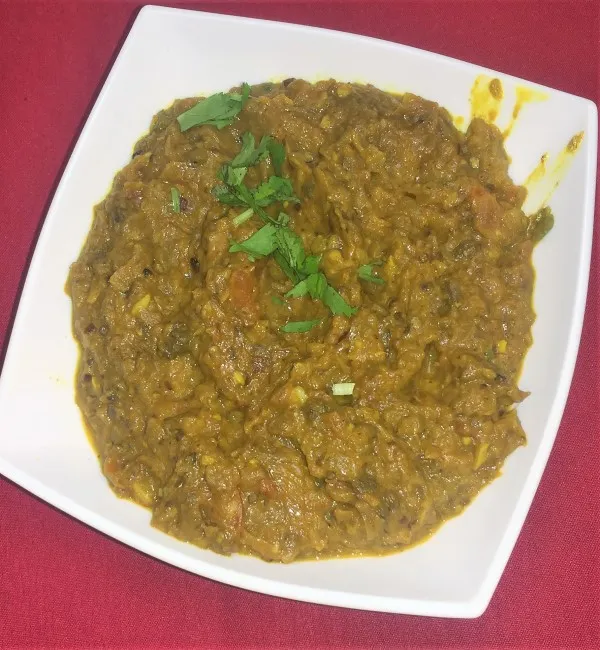 Bengan Bhartha In Ontario, ca, Bengan Bhartha near me, roasted eggplant curry, Indian vegetarian dishes, smoky eggplant recipe
